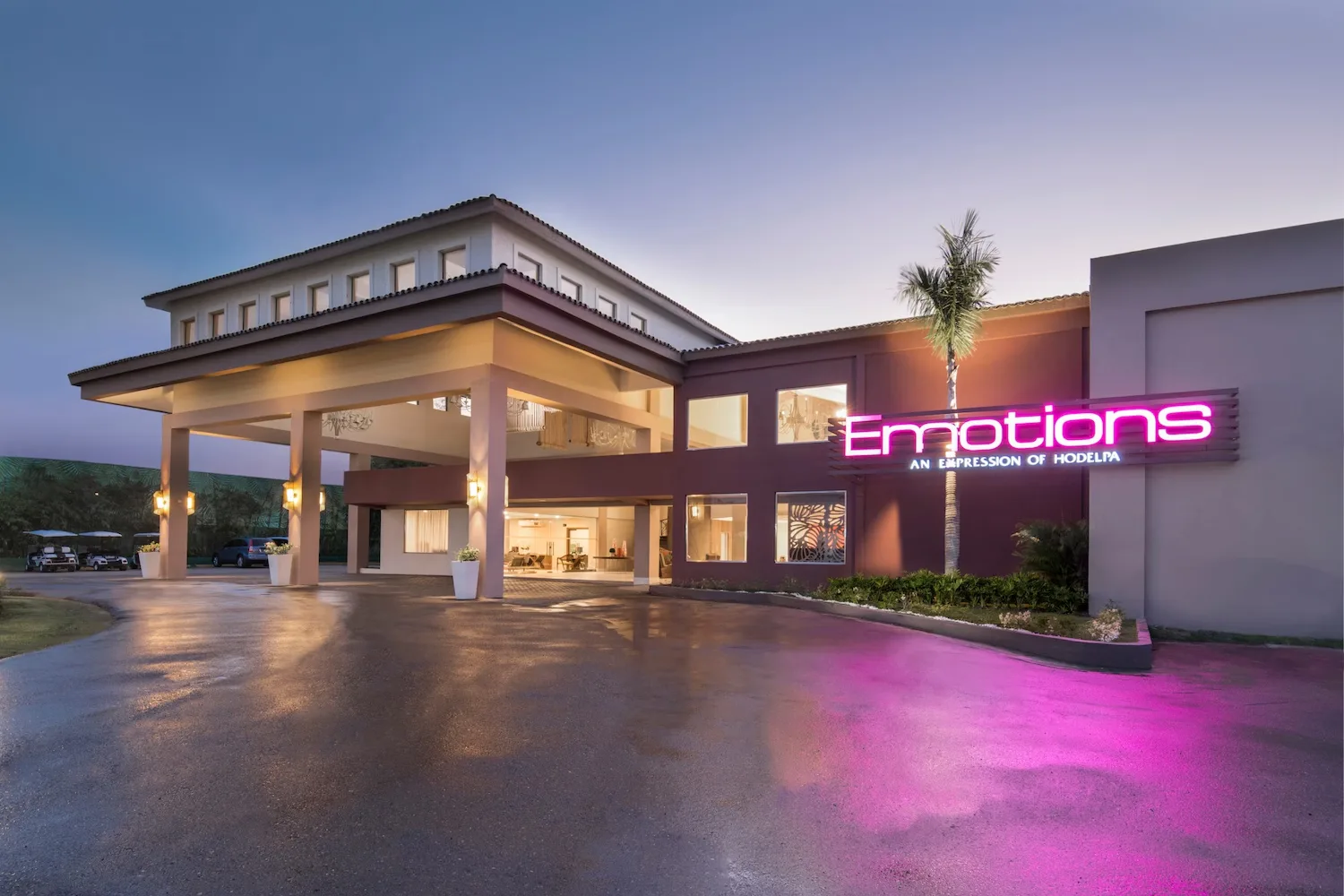 Emotions resort entrance at night
